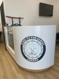 Kung Fu for Christ Canada welcome desk Kung Fu for Christ Canada front desk